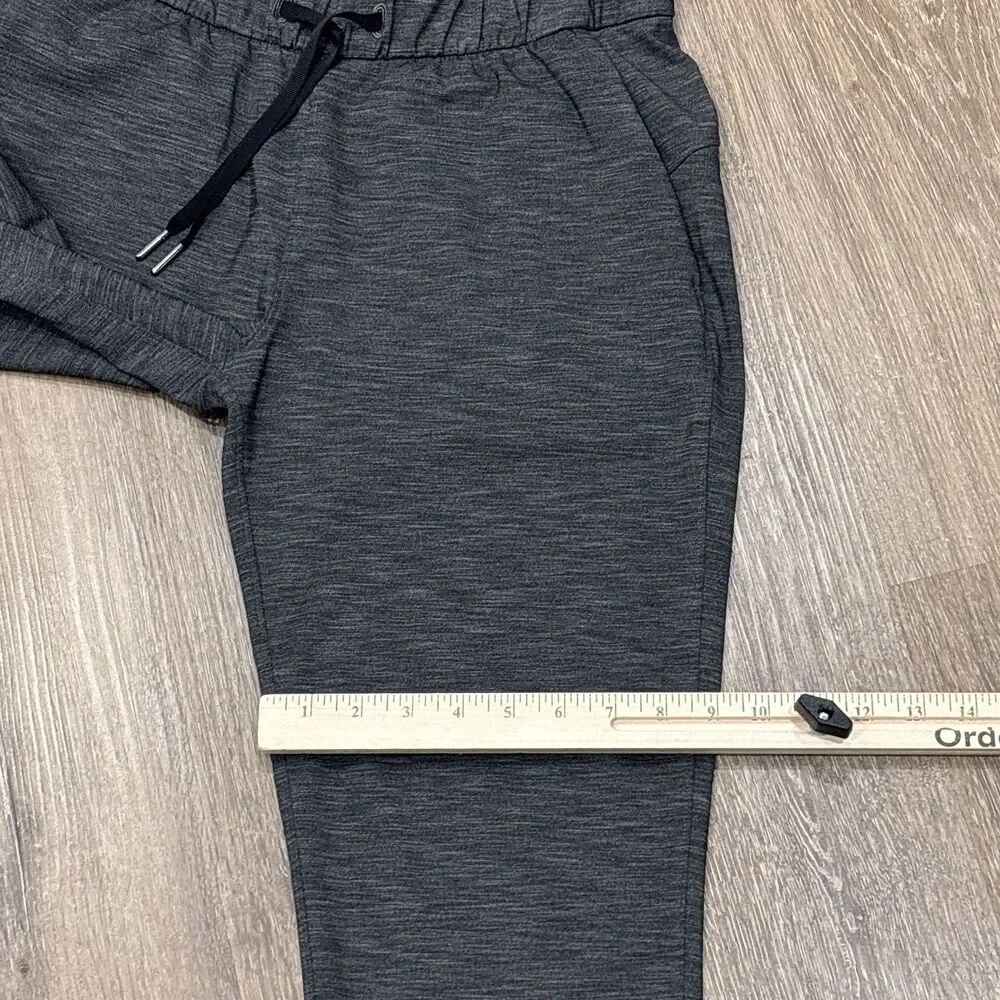 Lululemon On The Fly Pant Womens 6 Gray Heathered Black Pockets